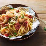 This foil-packet shrimp pasta is rich, easy to bake, and perfect for busy nights. Learn how to make this satisfying, mess-free meal in no time.